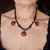 Collana in onice con conhigliette rosse