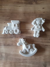 Gessetti a forma di treno,bambola e cavallo a dondolo