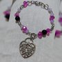 Bracciale con cristalli, lavanda, fucsia e perle nere e charms a forma di lucchetto a cuore