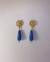 orecchini pendenti con pietre azzurre e zama dorato
