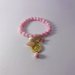 bracciale rosa con varie pietre e zama