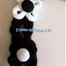 Collana tricotin bianca e nera con fiori