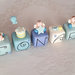 cake topper cubi con angioletti in mongolfiera in scala di blu 8 cubi 8 lettere 