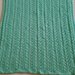 copertina  verde tiffany di  misto lana , fatta a mano 