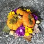 Centrotavola autunnale con zucche e fiori di feltro