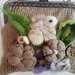 Borsa in lana infeltrita decorata con oggetti in lana cardata e chiusura click clack