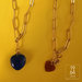 Collana con pendente cuore blu