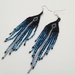 Orecchini pendenti di perline nativi americani. Neri, argento e blu.