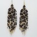 Orecchini pendenti di perline nativi americani.Maculati marroni.