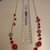 Collana catena con perle e pietre Rosse