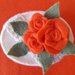 Scatolina portaoggetti, in pannolenci con applicazioni floreali, colore 🧡 arancione.