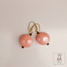 orecchini con perle in ceramica luminosa forma rotondo mezzo bombato col rosa 18 mm 