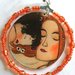Klimt maternità orecchini a cerchio toni arancione. 