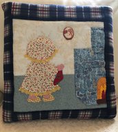 Quillow, un cuscino che diventa una coperta, decorato con Sue Sunbonnet con calza befana