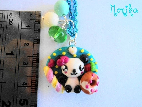 Collana con ciondolo a forma di cuore e panda opale in argento sterling