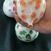 Palloncino 9 cm in ceramica con pennellate di colore 