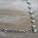 bracciale in acciaio con perle bianche
