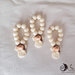 bomboniera prima comunione rosario con angelo bianco per bimba e cuoricino perlescente oro