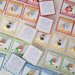 Card Art compleanno animaletti giungla quadrate smerlate multicolor etichette segnaposto