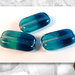 20 Perle in vetro bicolore  - 24 x 13 x 7 mm - Colore: Petrolio - verde acqua