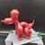 Statua Cane palloncino balloon dog, con base, in resina rosso metallizzato