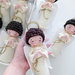 Bomboniera prima comunione bimbo angelo custode amigurumi.