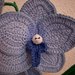 Orchidea d’appoggio fatta all’uncinetto 