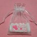 Sacchettino portaconfetti 🤍💗 bianco/rosa traforato, con laccetto🎀decoro con piccoli fiori 🌸🌸
