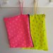 Pochette idrorepellente gialla o fuxia 