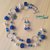 Collana lunga con perle lampwork e orecchini abbinati, blu argento