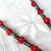 Collana di cuoio con perline Picasso e pendente tribale