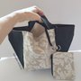 borsa a mano nera e beige fantasia "cachemire"