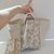 borsa a mano color corda e beige fantasia "cachemire"