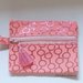 Portachiavi / portamonete rosa con zip e nappina
