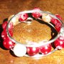 Anello con perline rosse