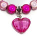 Bracciale perle 5 colori con cuore fucsia 