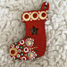 Decorazione natalizia a forma di calza decorata con mandala