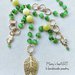 Collana a rosario con pietre dure verdi e elementi a foglia in zama 