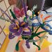 Composizione di 3 tipi di fiori ad uncinetto: iris, narcisi e lavanda