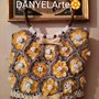 Borsa granny square 🌼Primule🏵 nelle tonalità del giallo 💛 chiaro e del giallo 🧡 intenso, con manici rotondi in bambú scuro. 