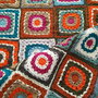 Copertina  in lana  colorata per carrozzina neonato/a