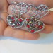 Orecchini donna wire doppi cuori in acciaio inossidabile con cristalli colore rosso e argento