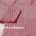 Coprifasce per  neonata in pura lana merino rosa con laccetti laterali