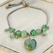 Bracciale “Verde d’Irlanda” in acciaio inossidabile con pendente cuore e pietre di avventurina verde