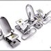 Clip per bretelle in metallo cromato, con denti in plastica - larghezza passante mm.25 - 4 pezzi