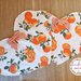 Coppia di tovagliette americane a cuore in cotone con arance 