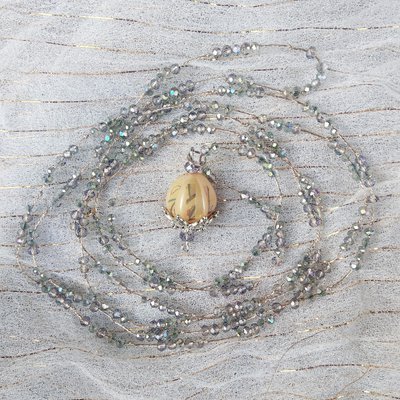 Collana chiama angeli con BOCCIOLO e perline trasparenti sfaccettate. Collana chiama angeli con BOCCIOLO e perline trasparenti sfaccettate.