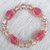 Braccialetto 2in1 con perle sfaccettate rosa e trasparenti + cuori.