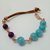 Bracciale in rame e pelle con perle vere colorate