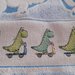 asciugamano bimbo dinosauri